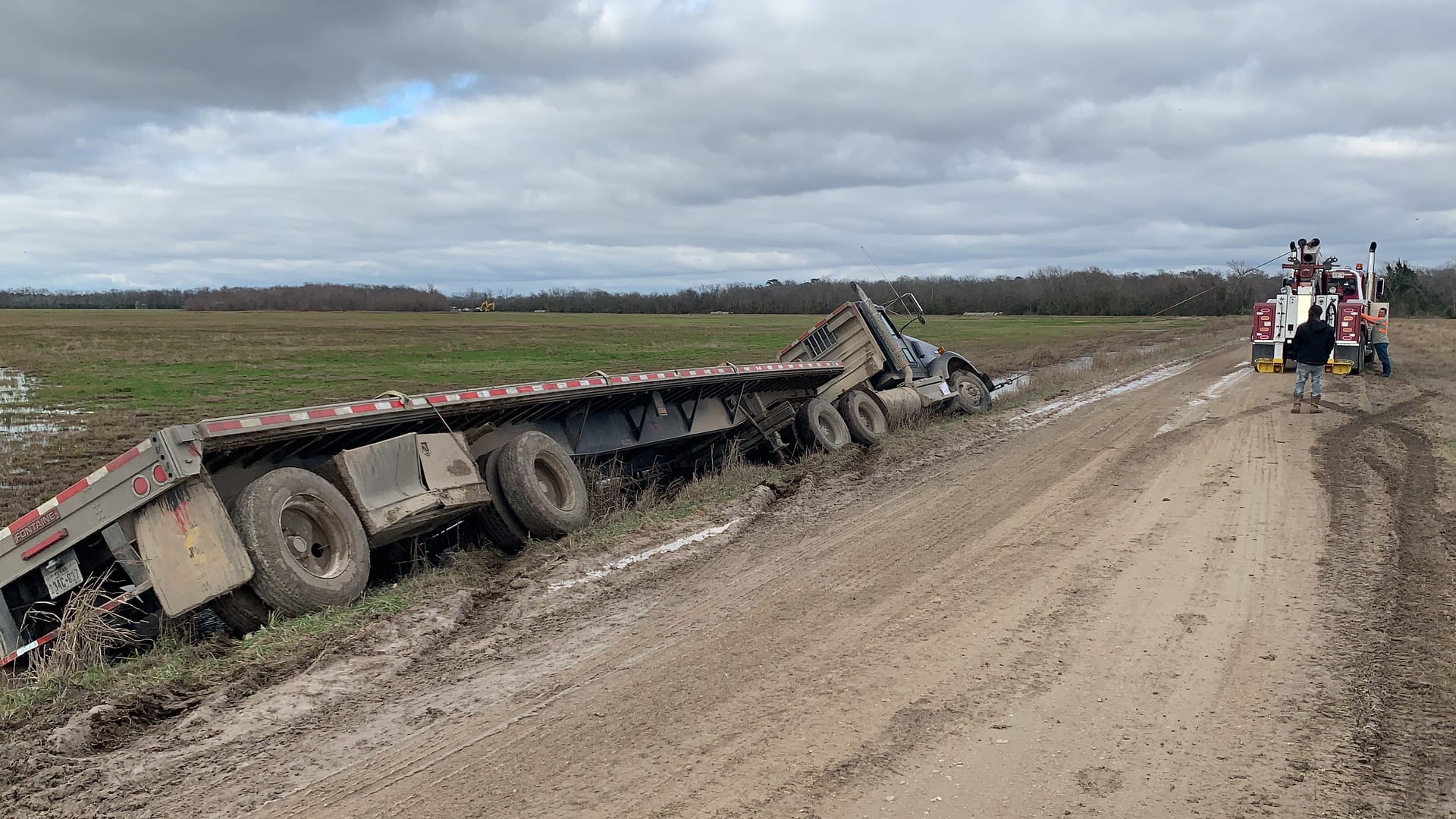 Smith Towing flatbed recovery near Huffman, TX